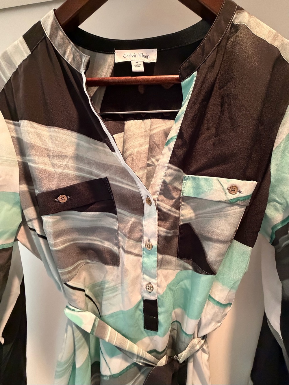 Calvin Klein Women’s Size Medium Blouse with matching belt.